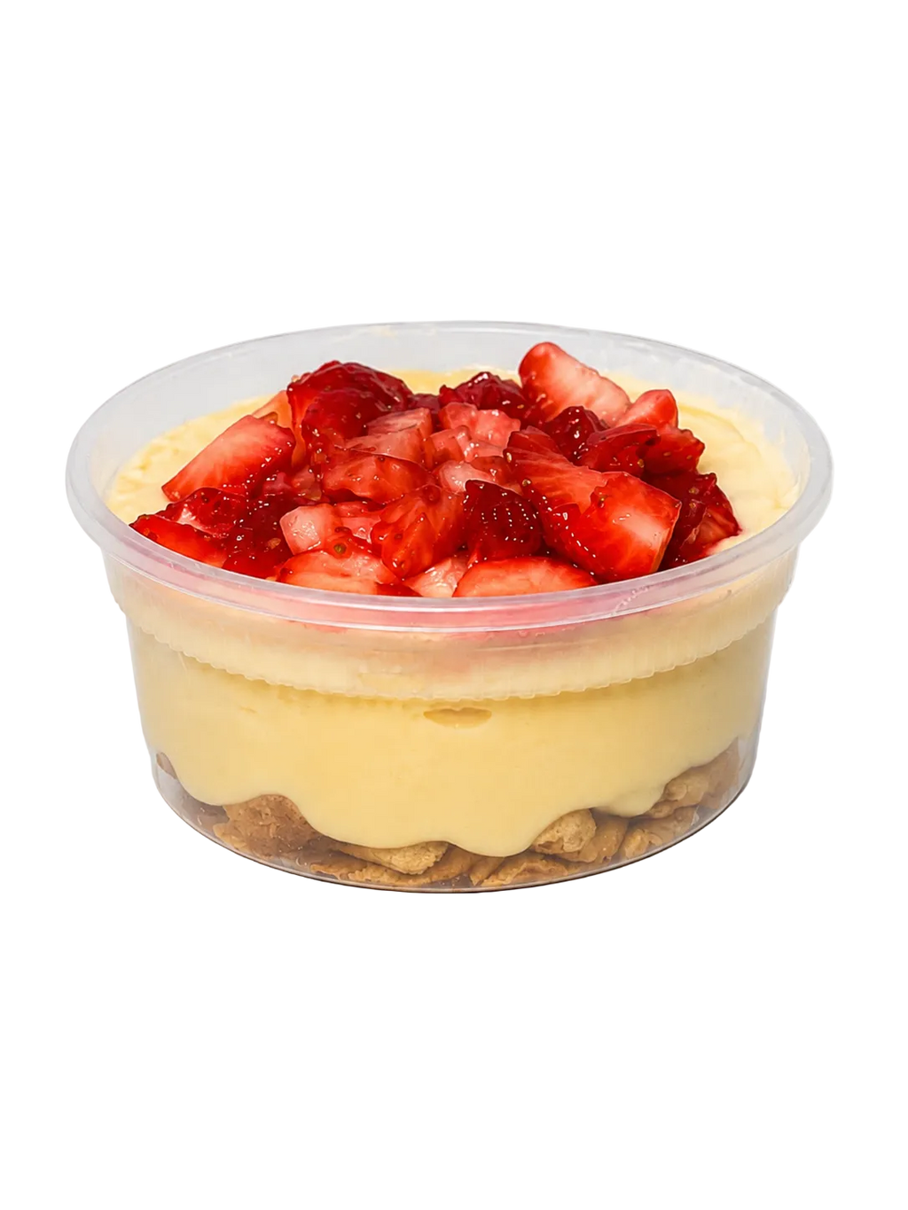 Banana pudding dessert in a clear container topped with strawberries on a white background
